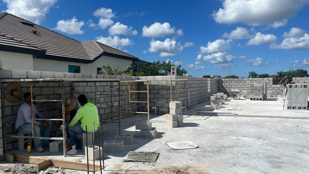 building the outer walls of the house